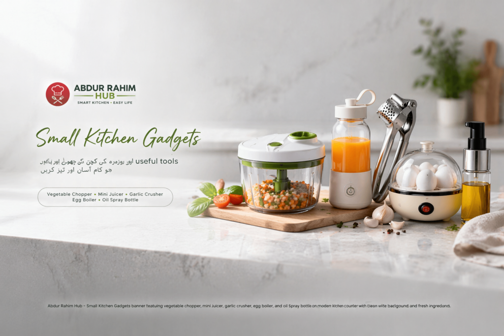 small kitchen gadgets including vegetable chopper, mini juicer, garlic crusher, egg boiler and oil spray bottle on modern kitchen counter